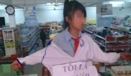 Nữ sinh bị trói vào lan can, treo bảng tự nhận ăn trộm